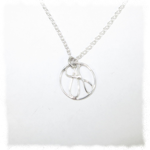 Silver scrunched disc pendant